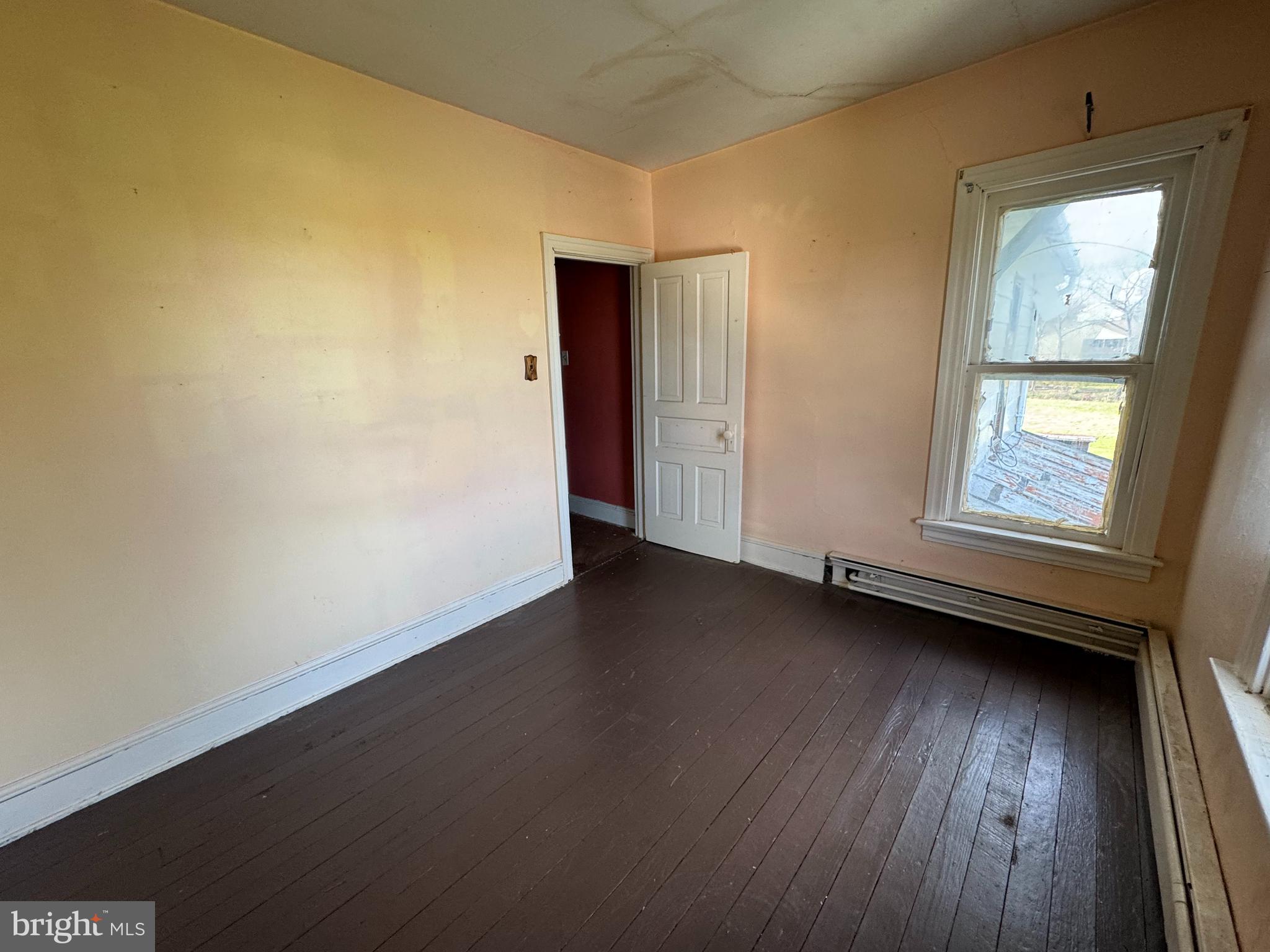 1951 Park Street Dover, PA 17315 - Photo 31 of 38 an empty room with wooden floor and windows