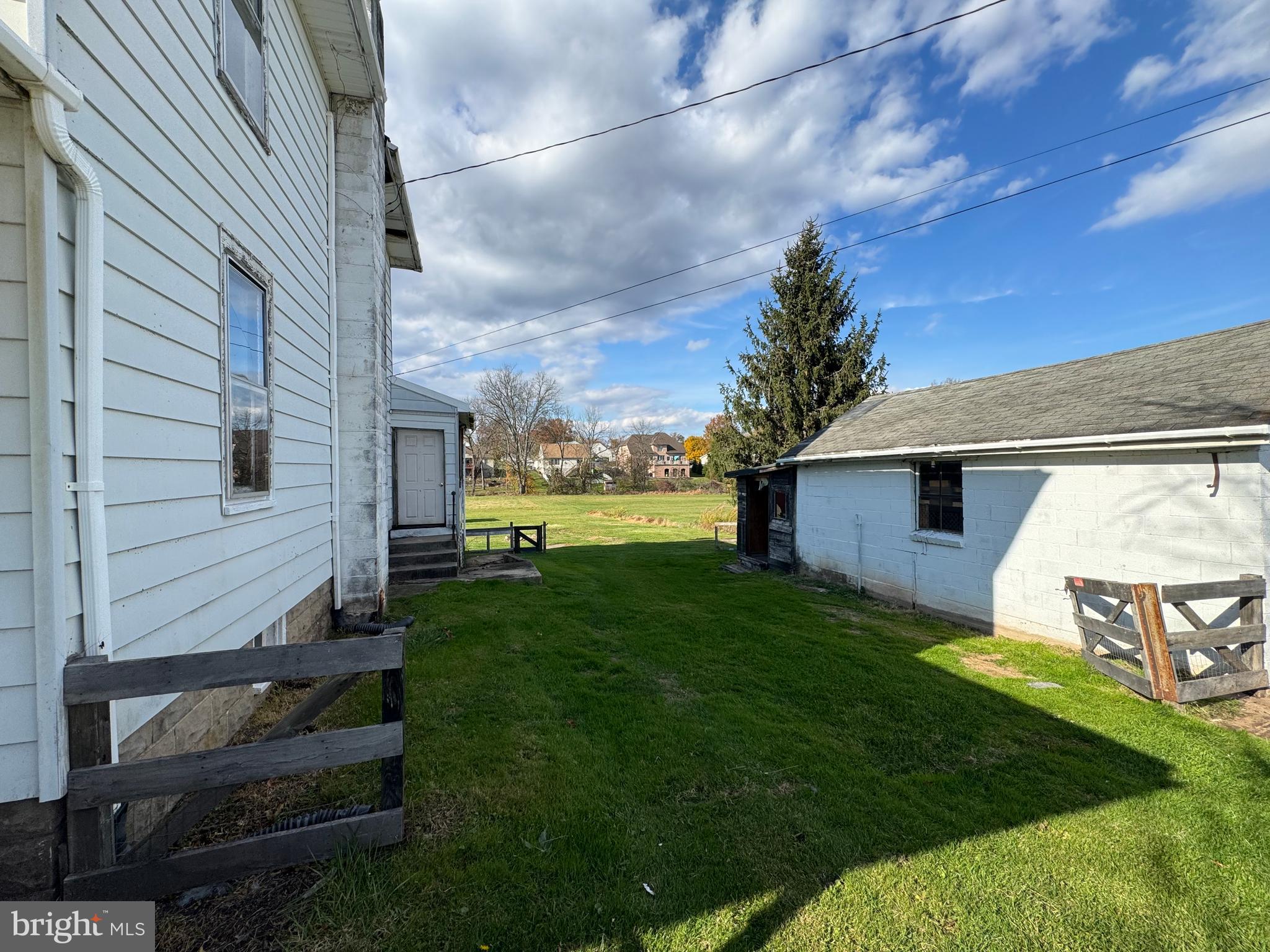 1951 Park Street Dover, PA 17315 - Photo 5 of 38 a view of a backyard with plants and a patio