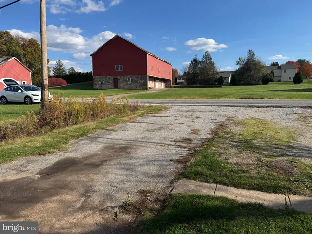 a view of a house with a big yard