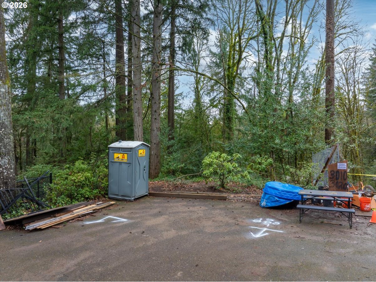 3014 Southwest Nottingham Drive Portland, OR 97201 - Photo 14 of 22 a backyard of a house with a fire pit and outdoor seating