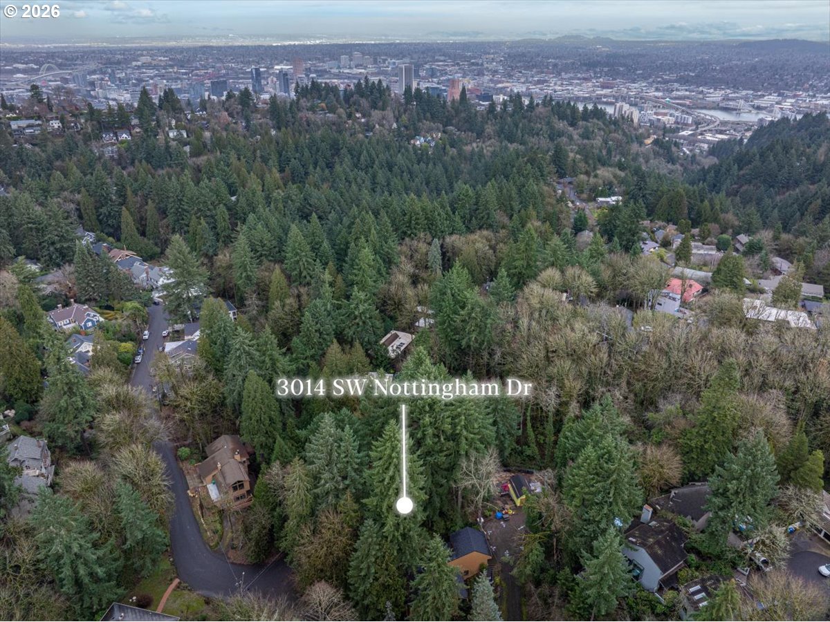3014 Southwest Nottingham Drive Portland, OR 97201 - Photo 20 of 22 an aerial view of residential house with outdoor space and trees all around