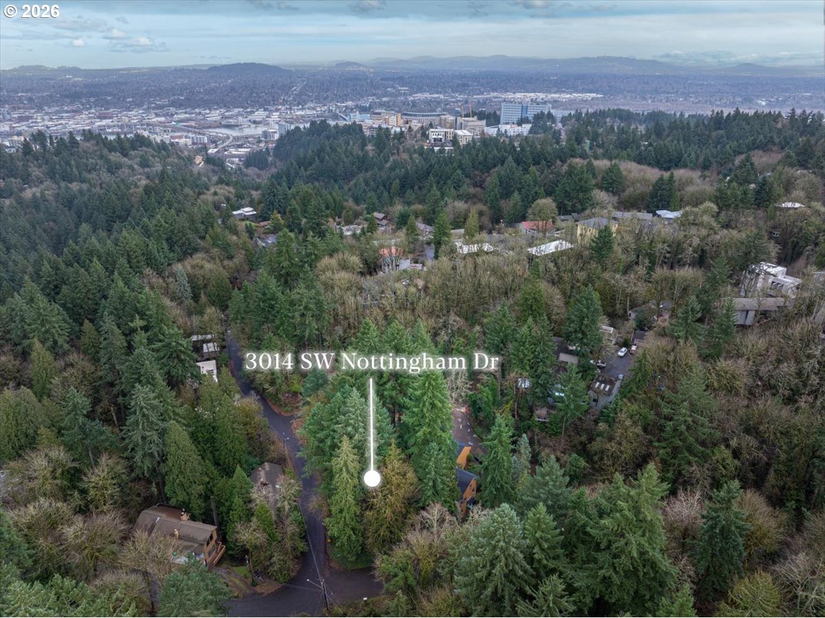 3014 Southwest Nottingham Drive Portland, OR 97201 - Photo 21 of 22 an aerial view of green landscape with trees and houses