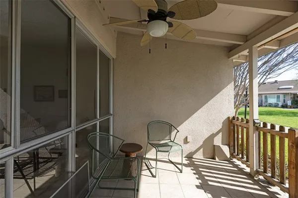 a view of balcony and deck with wooden floor
