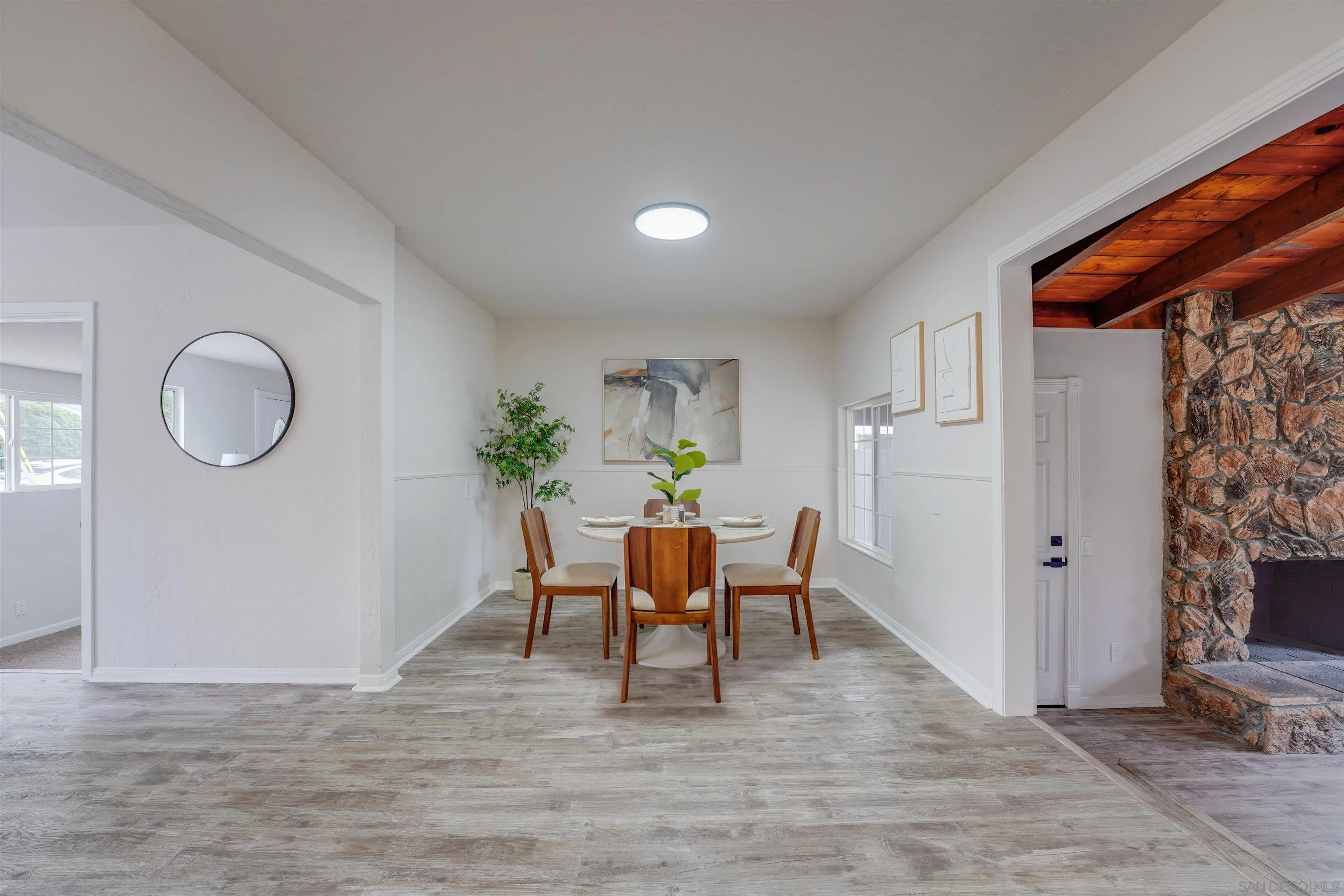 674 Palomar Avenue El Cajon, CA 92020 - Photo 11 of 56 a view of a dining room with furniture and wooden floor