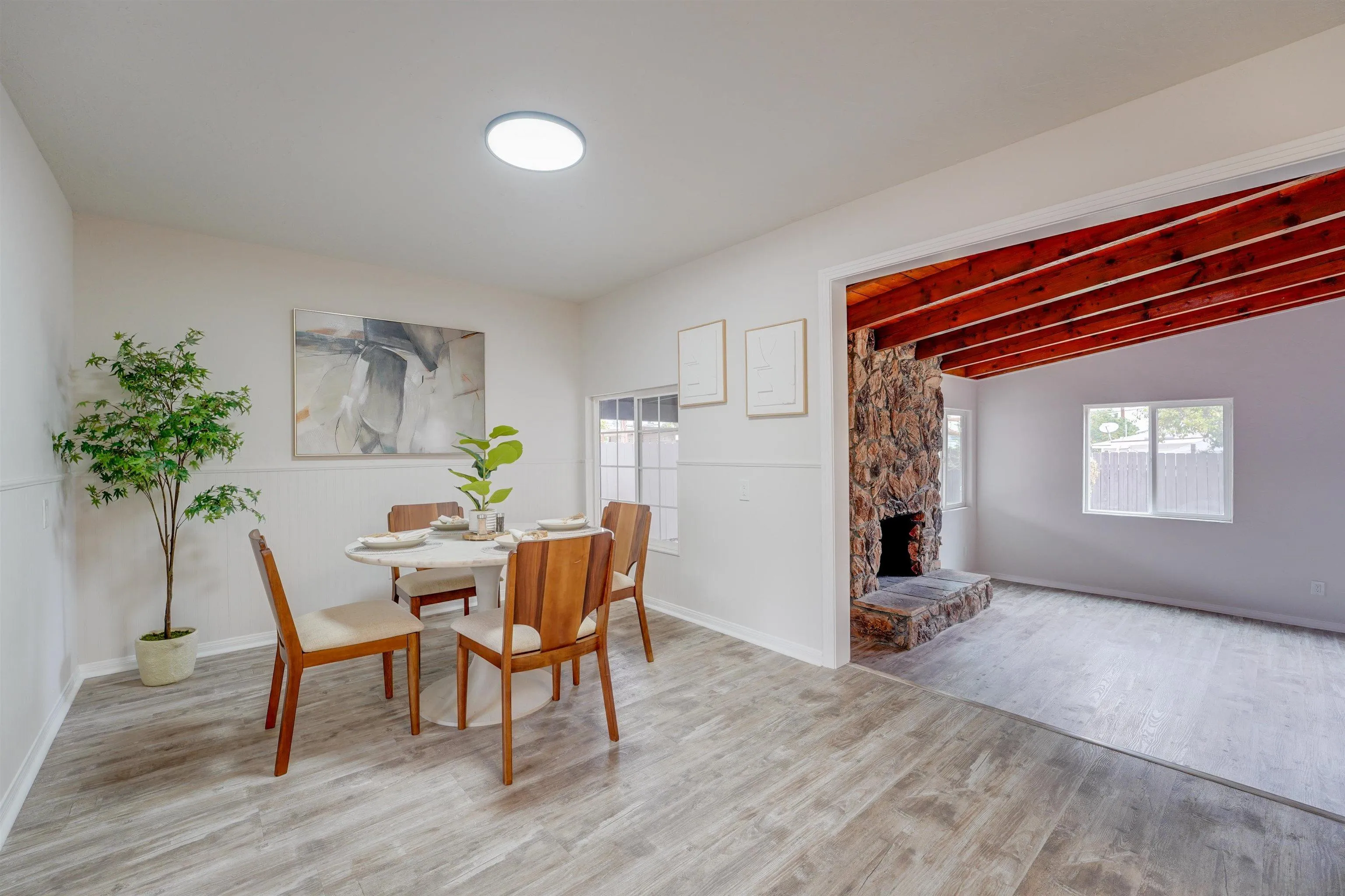 674 Palomar Avenue El Cajon, CA 92020 - Photo 15 of 56 a living room with furniture and a potted plant