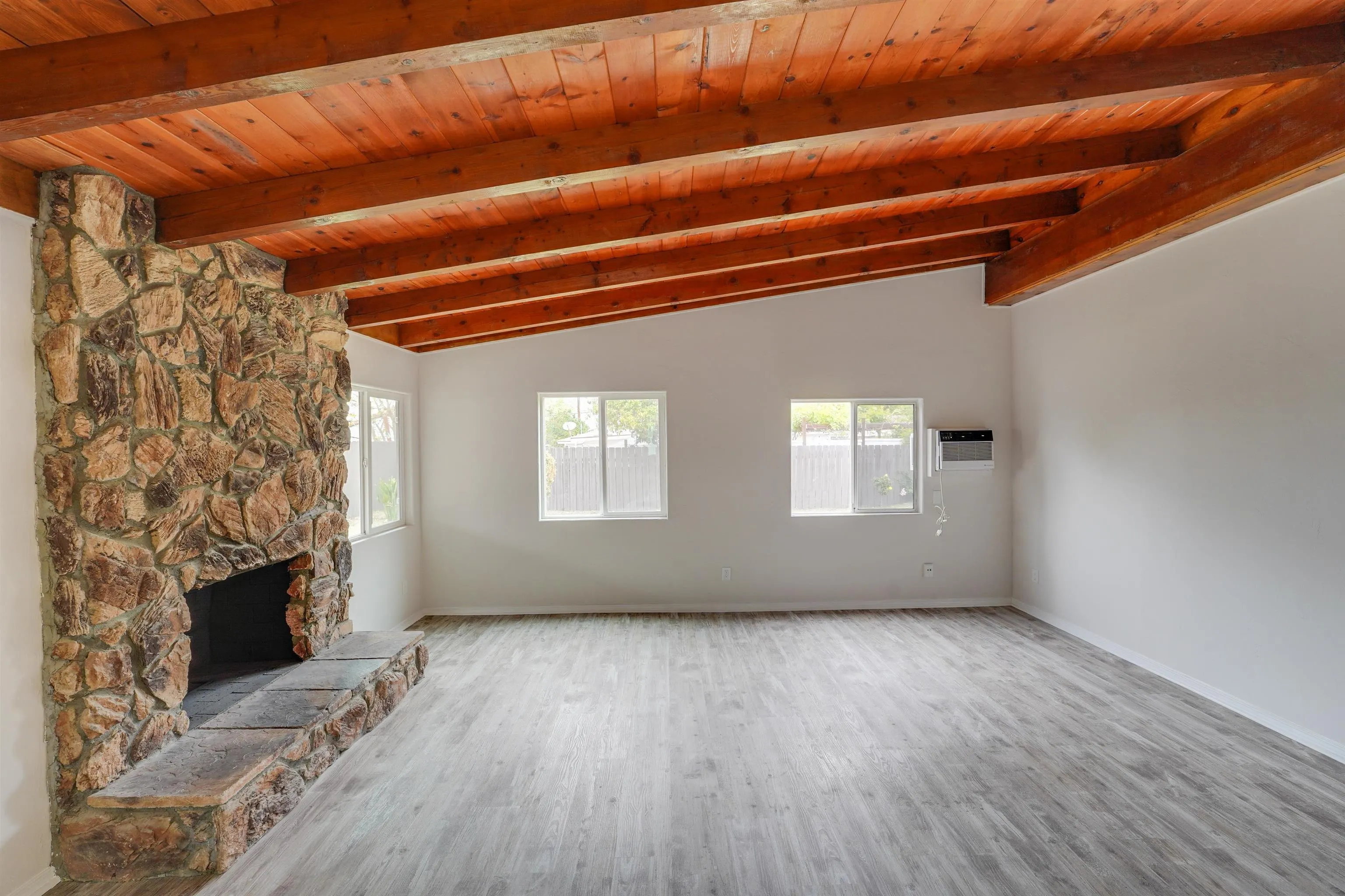 674 Palomar Avenue El Cajon, CA 92020 - Photo 25 of 56 a view of empty room with wooden floor and fireplace
