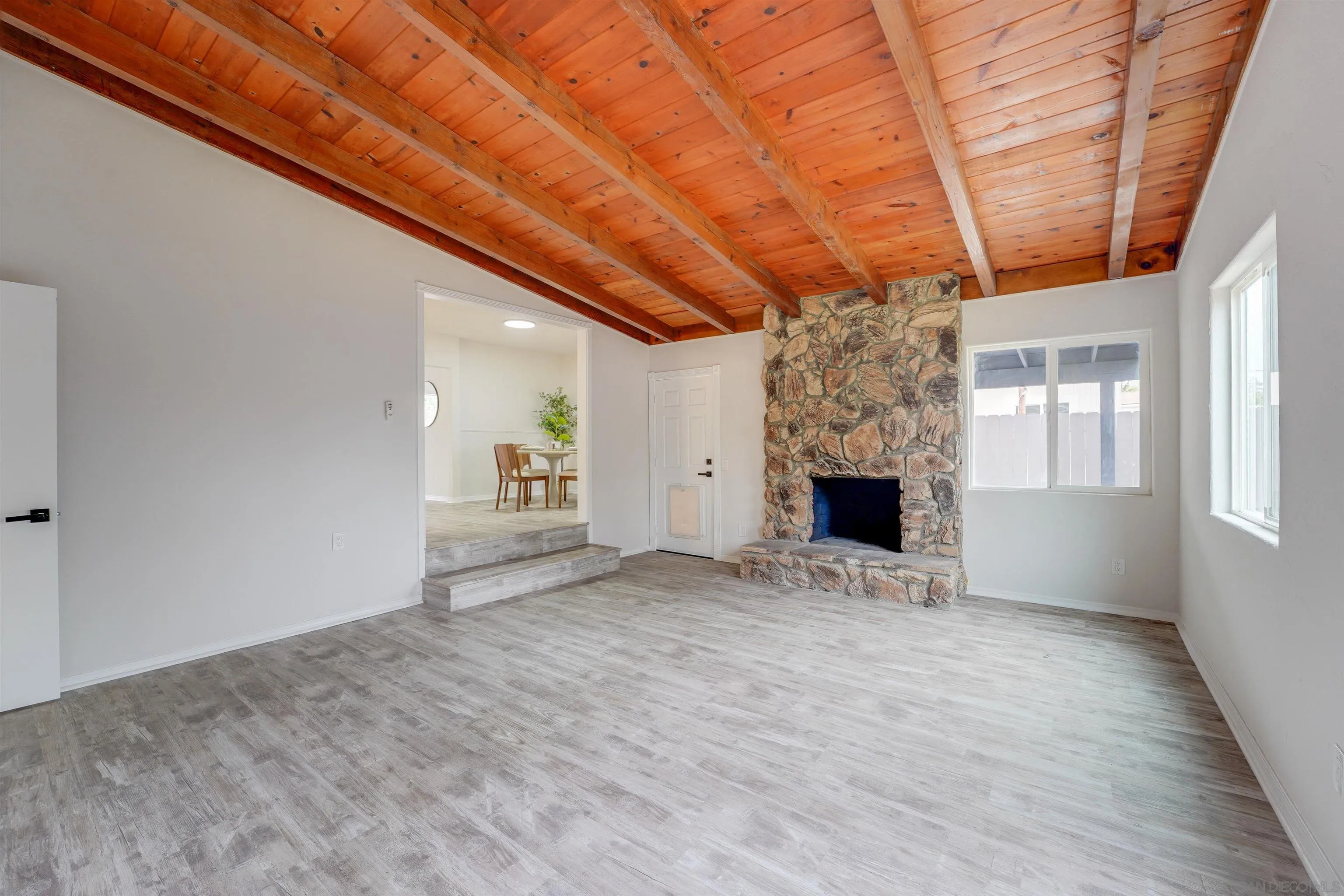 674 Palomar Avenue El Cajon, CA 92020 - Photo 27 of 56 a view of a livingroom with a fireplace and window