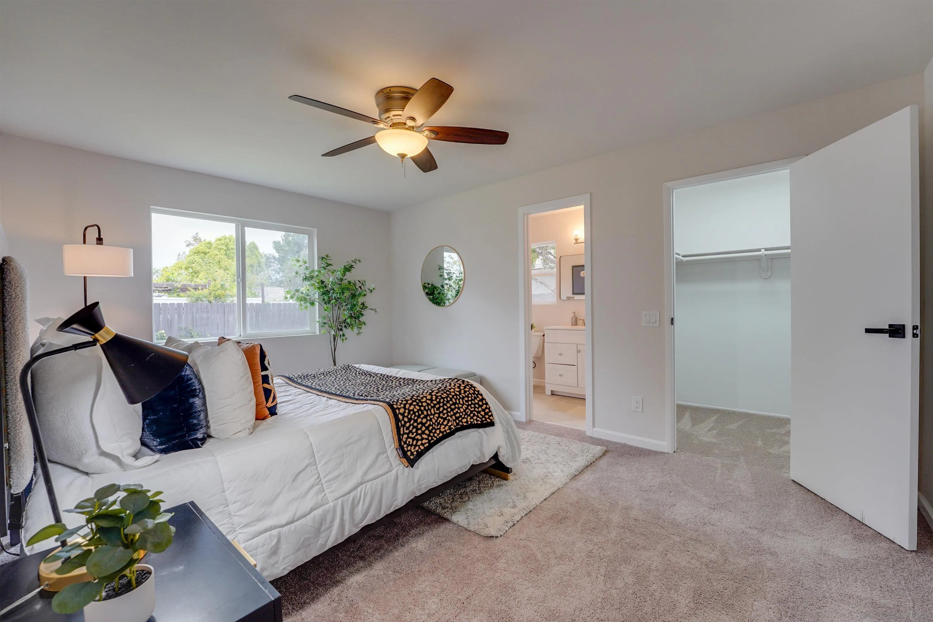 674 Palomar Avenue El Cajon, CA 92020 - Photo 30 of 56 a spacious bedroom with a bed and window
