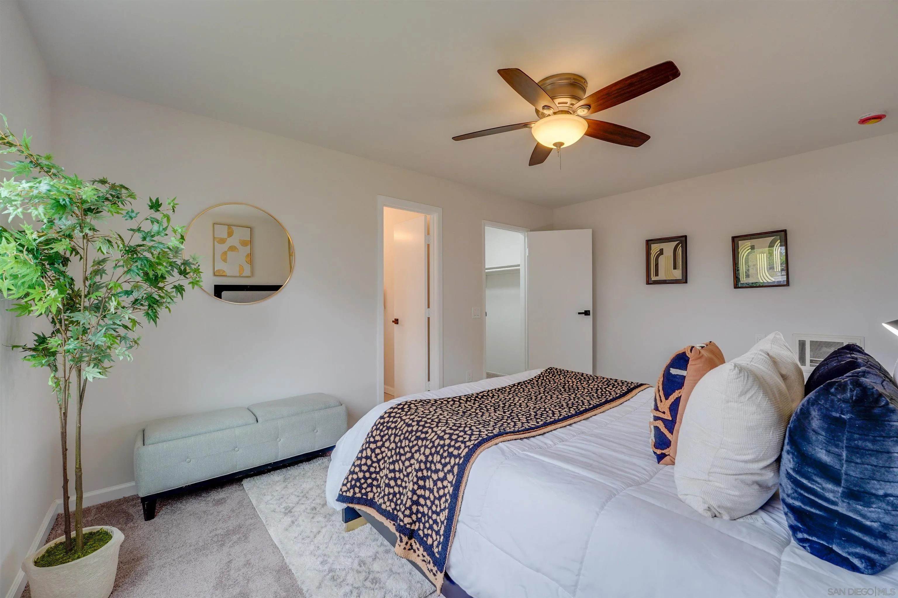 674 Palomar Avenue El Cajon, CA 92020 - Photo 32 of 56 a bed room with a bed and a potted plant