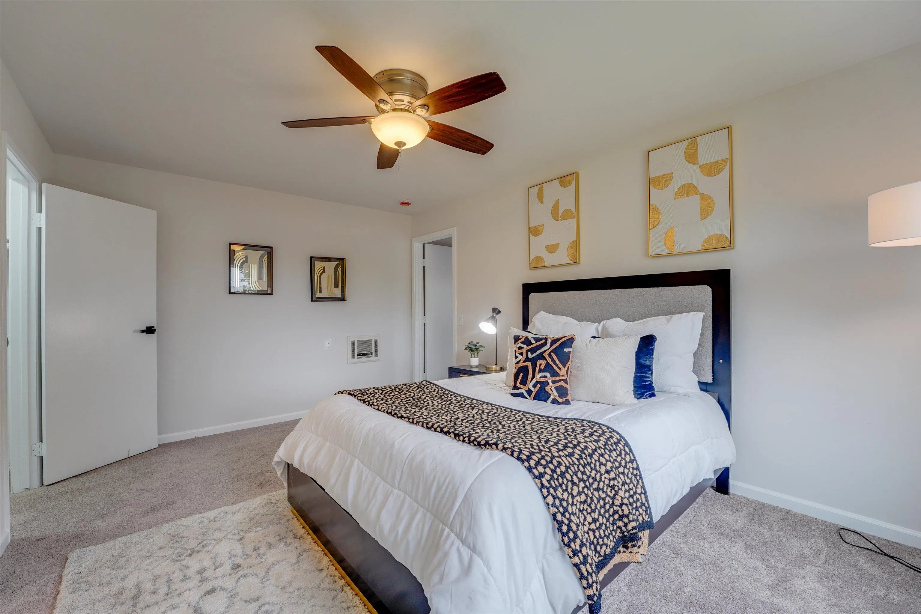 674 Palomar Avenue El Cajon, CA 92020 - Photo 33 of 56 a bedroom with a large bed and a chandelier