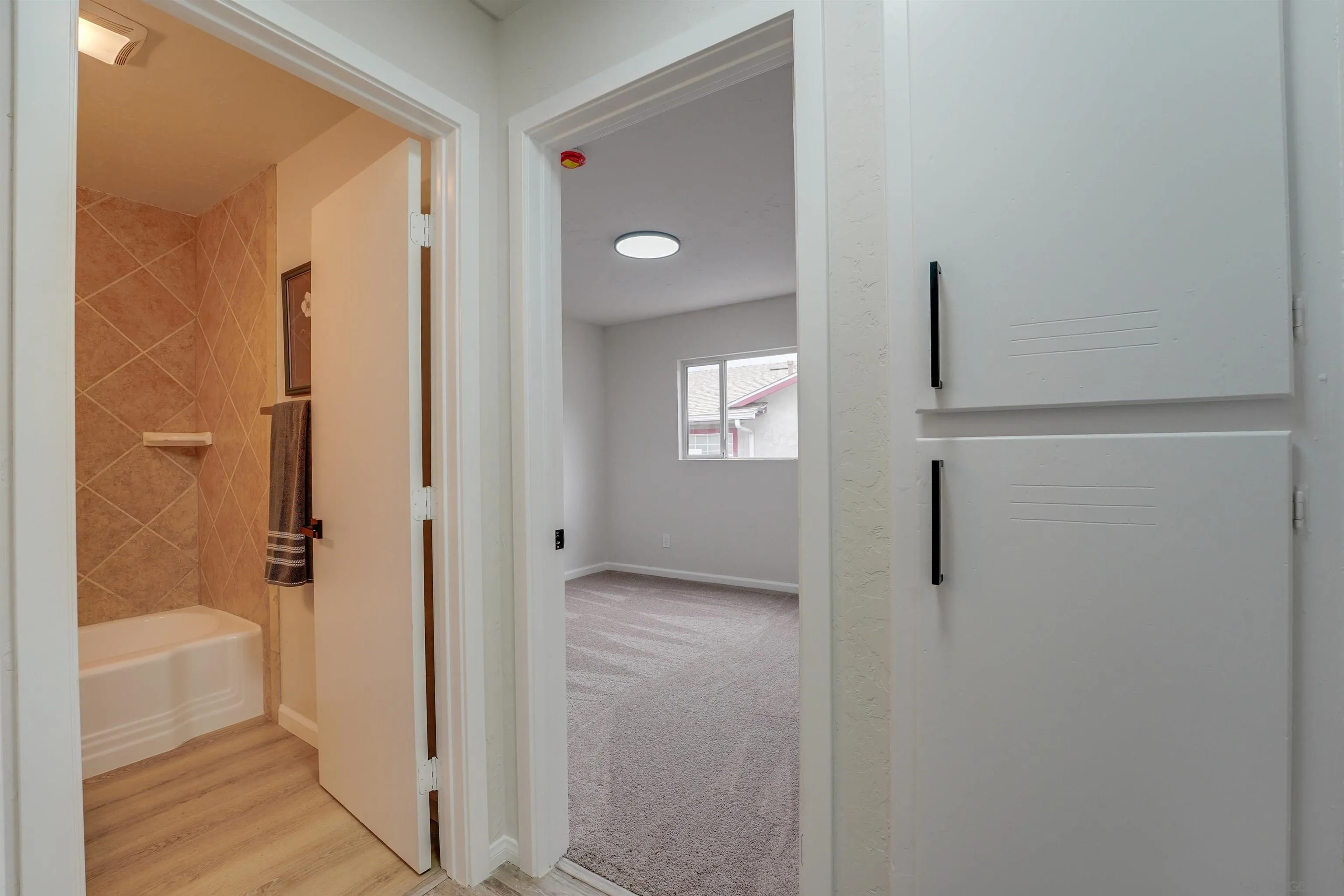 674 Palomar Avenue El Cajon, CA 92020 - Photo 36 of 56 a bathroom with a bathtub and a shower