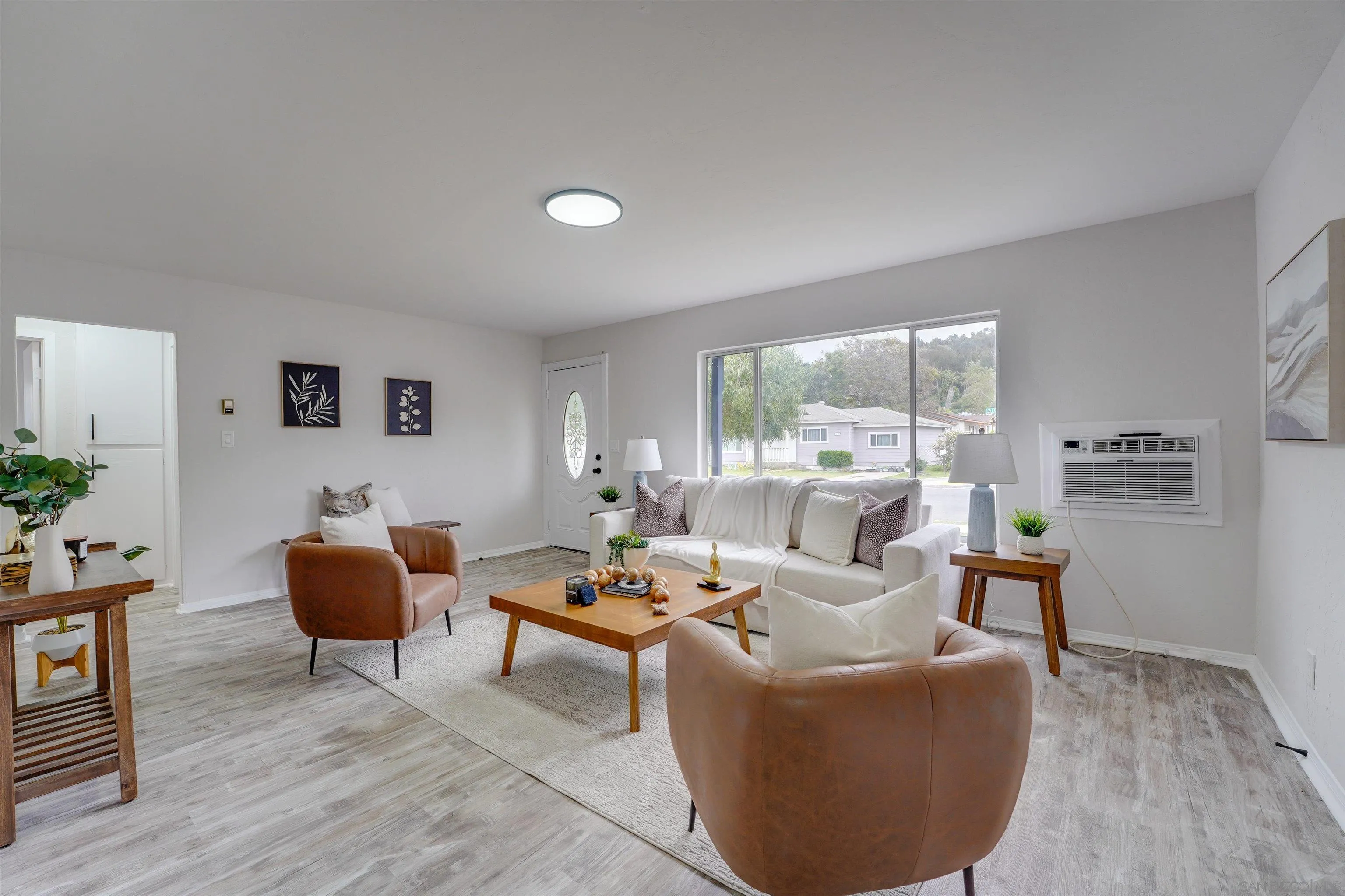 674 Palomar Avenue El Cajon, CA 92020 - Photo 6 of 56 a living room with furniture and a large window