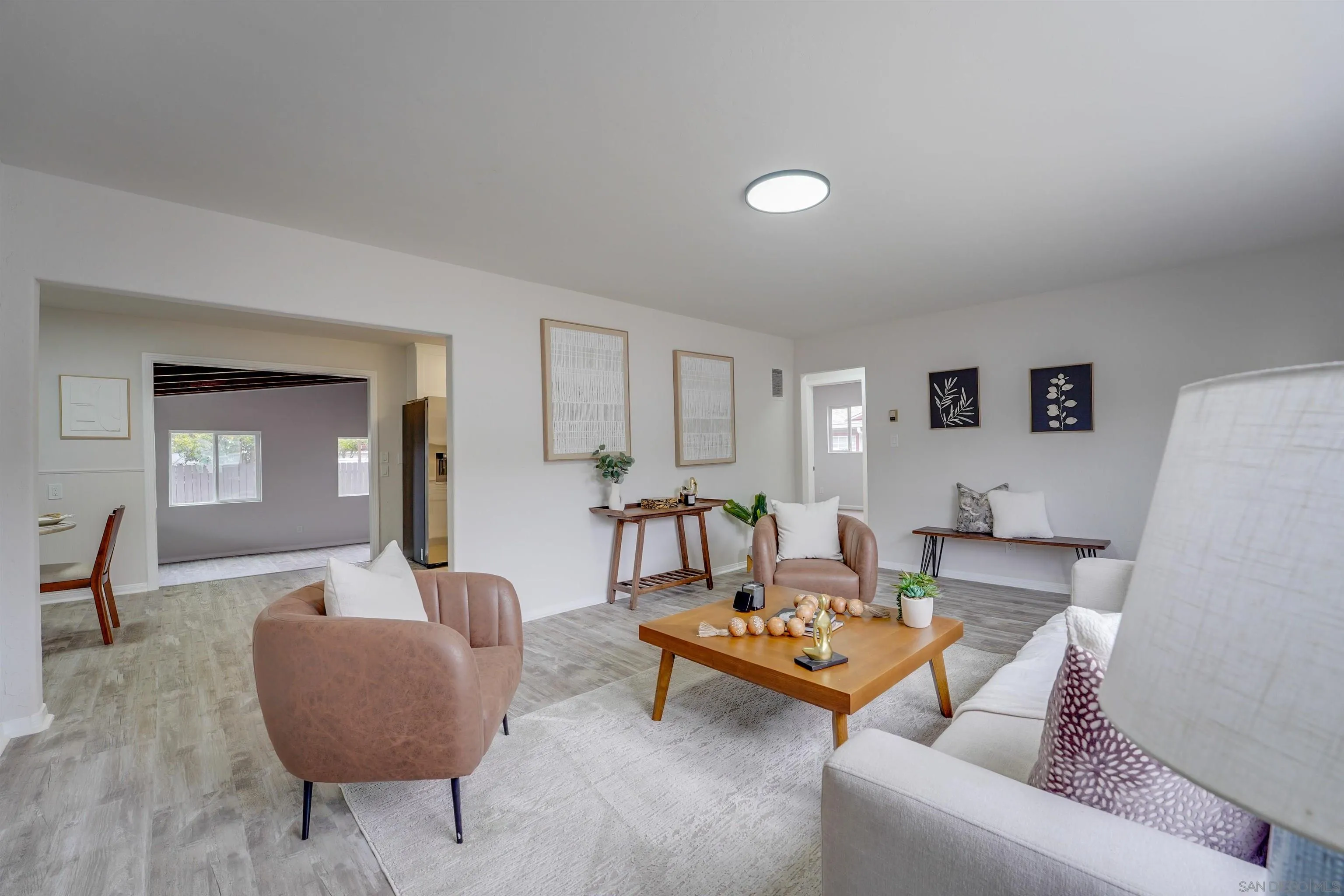 674 Palomar Avenue El Cajon, CA 92020 - Photo 8 of 56 a living room with furniture and wooden floor