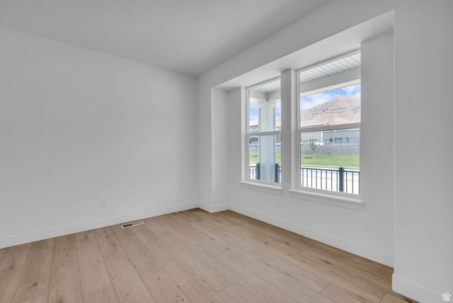 2821 Scarlet Road, Unit 149 Eagle Mountain, UT 84005 - Photo 6 of 28 Bright flex space with large windows looking to the mountains.