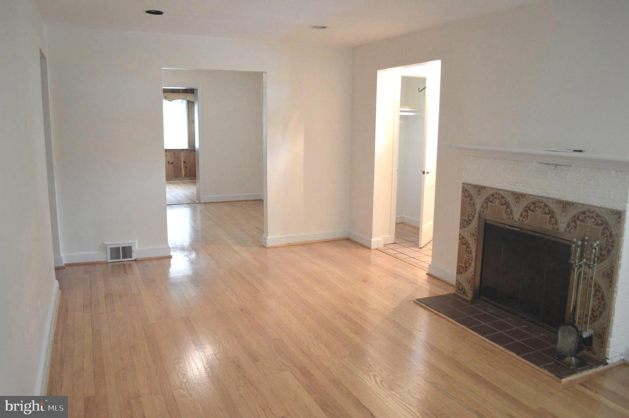 9115 Wire Avenue Silver Spring, MD 20901 - Photo 12 of 46 View of living/dining rooms and den