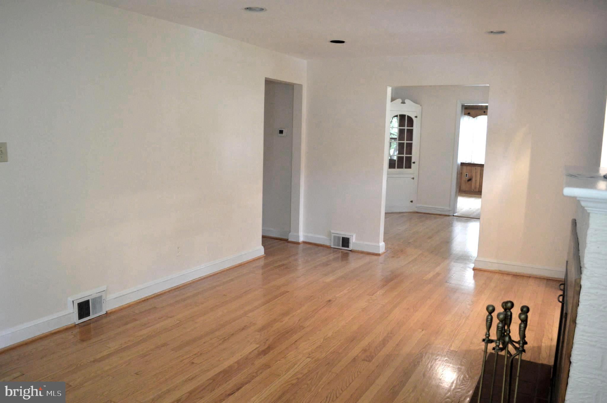 9115 Wire Avenue Silver Spring, MD 20901 - Photo 14 of 46 Another view of living/dining rooms and den