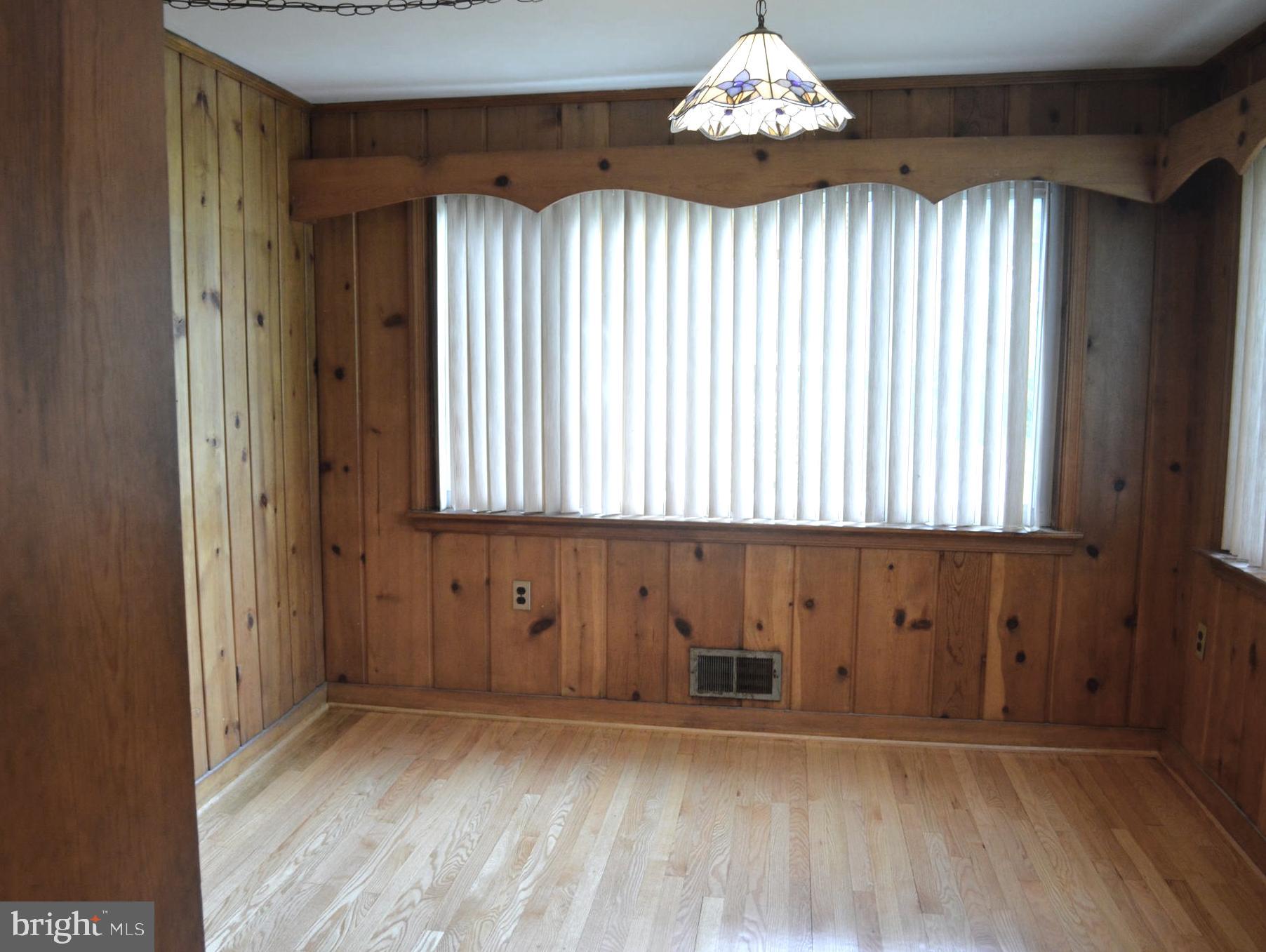 9115 Wire Avenue Silver Spring, MD 20901 - Photo 21 of 46 Den with pine paneling