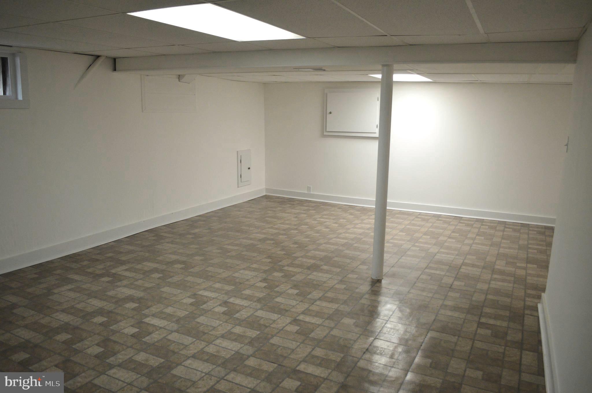9115 Wire Avenue Silver Spring, MD 20901 - Photo 42 of 46 Lower level recreation room