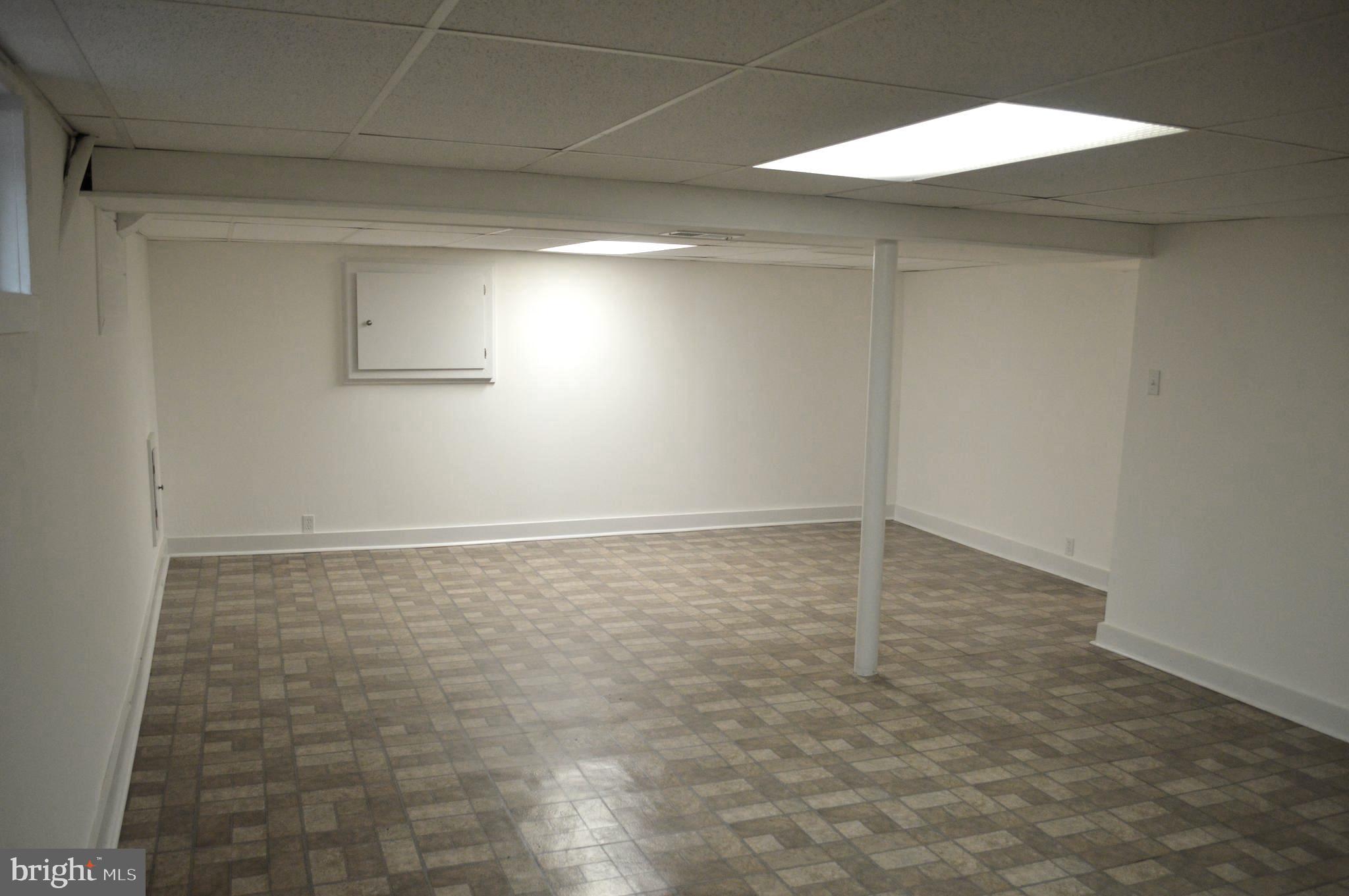 9115 Wire Avenue Silver Spring, MD 20901 - Photo 43 of 46 Lower level recreation room