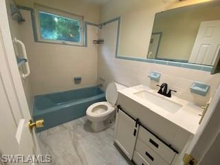 27677 Okeana Street, Unit 6 Bonita Springs, FL 34134 - Photo 16 of 31 a bathroom with a sink a toilet and a mirror