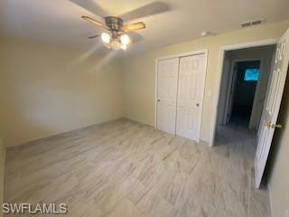 27677 Okeana Street, Unit 6 Bonita Springs, FL 34134 - Photo 18 of 31 wooden floor in an empty room