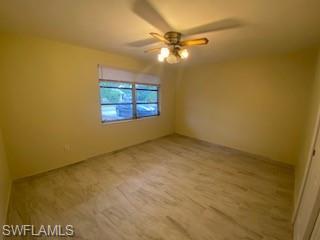 27677 Okeana Street, Unit 6 Bonita Springs, FL 34134 - Photo 19 of 31 an empty room with a window