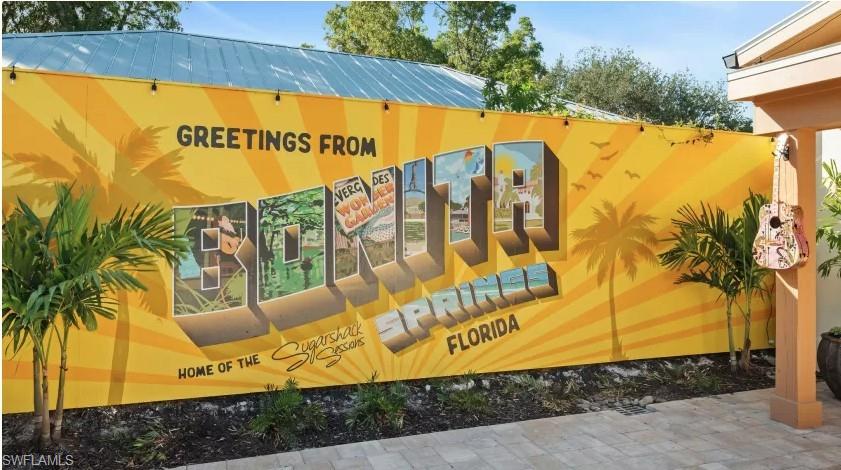 27677 Okeana Street, Unit 6 Bonita Springs, FL 34134 - Photo 3 of 31 a view of swimming pool with a garden