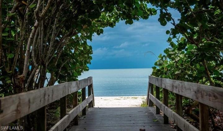 27677 Okeana Street, Unit 6 Bonita Springs, FL 34134 - Photo 5 of 31 a view of a balcony with an outdoor space