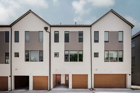 a view of residential houses with building