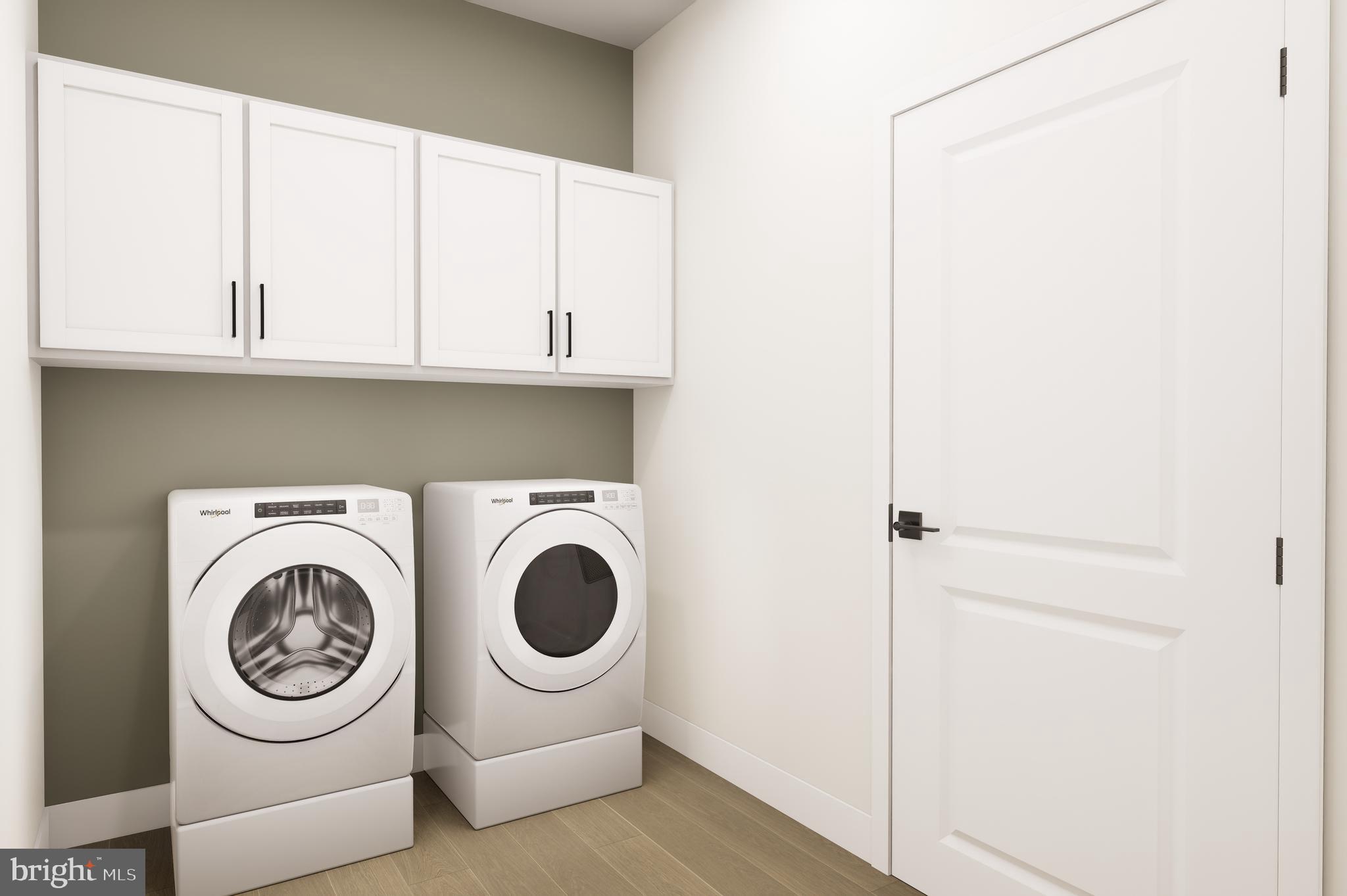 1121 Fortune Terrace, Unit 507 Potomac, MD 20854 - Photo 12 of 13 a utility room with dryer and washer