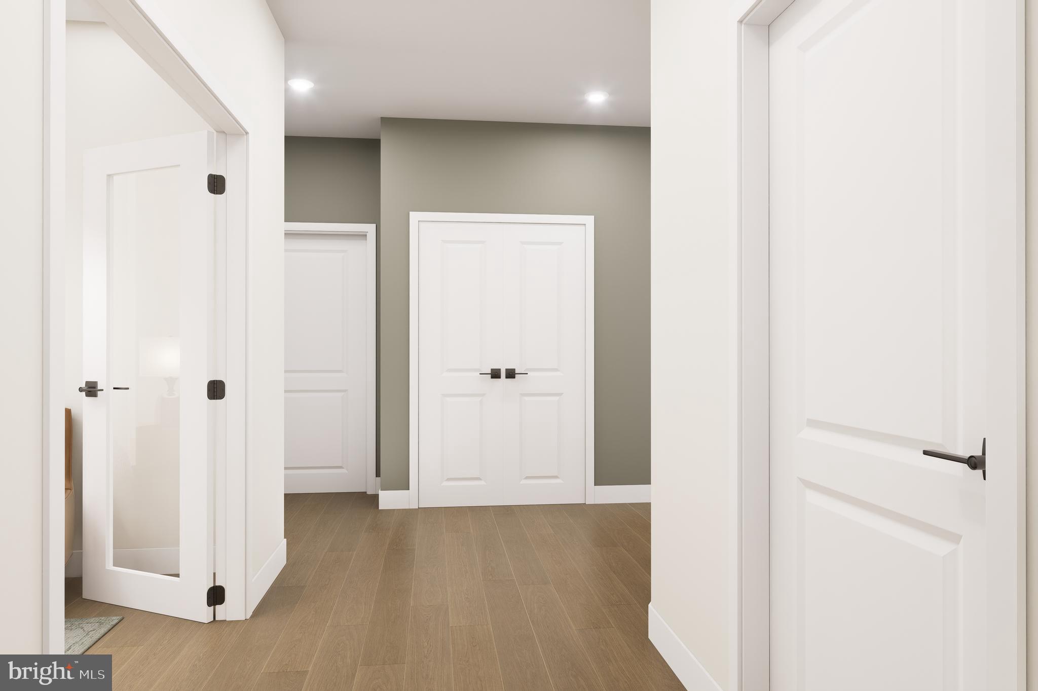 1121 Fortune Terrace, Unit 507 Potomac, MD 20854 - Photo 2 of 13 a view of a hallway with wooden floor