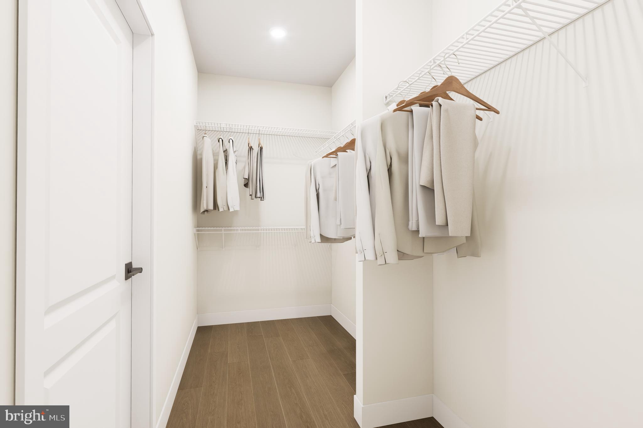 1121 Fortune Terrace, Unit 507 Potomac, MD 20854 - Photo 9 of 13 a view of walk in closet with clothes
