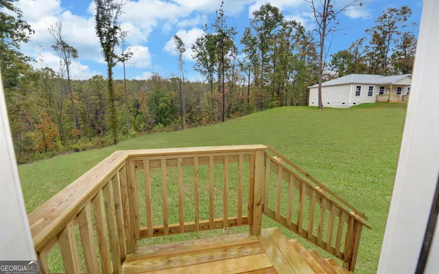 a view of a balcony with an outdoor space