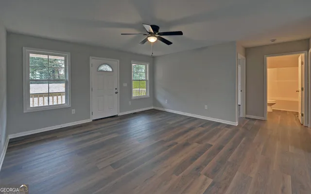 an empty room that has a window