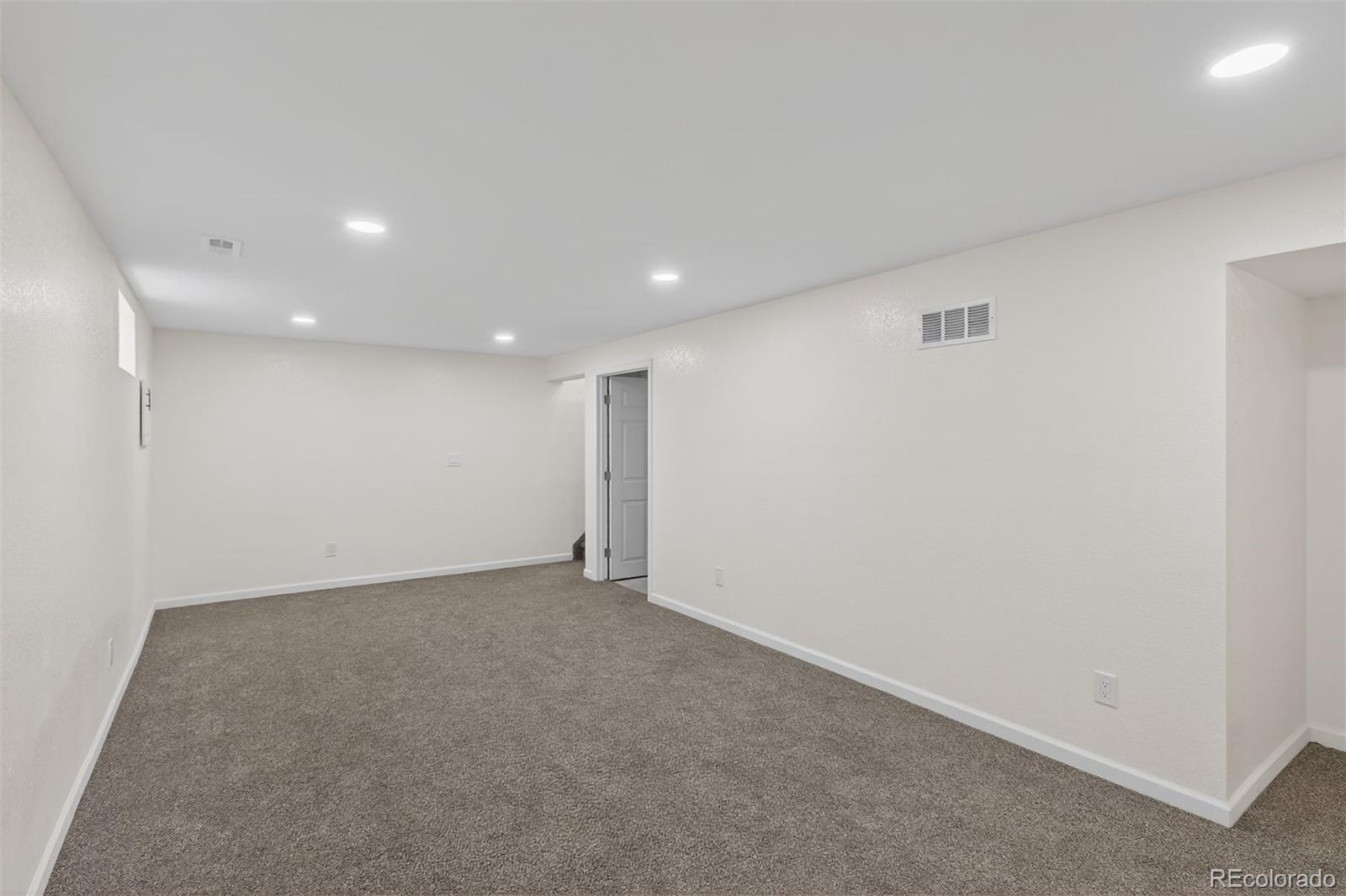 9079 Dudley Street Westminster, CO 80021 - Photo 18 of 37 a view of an empty room