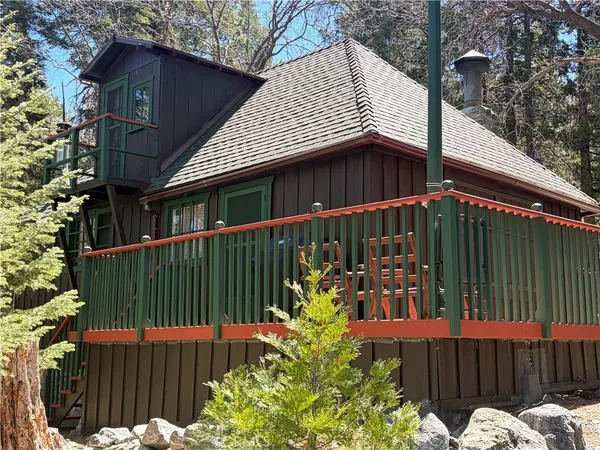 a view of a deck with a wooden fence