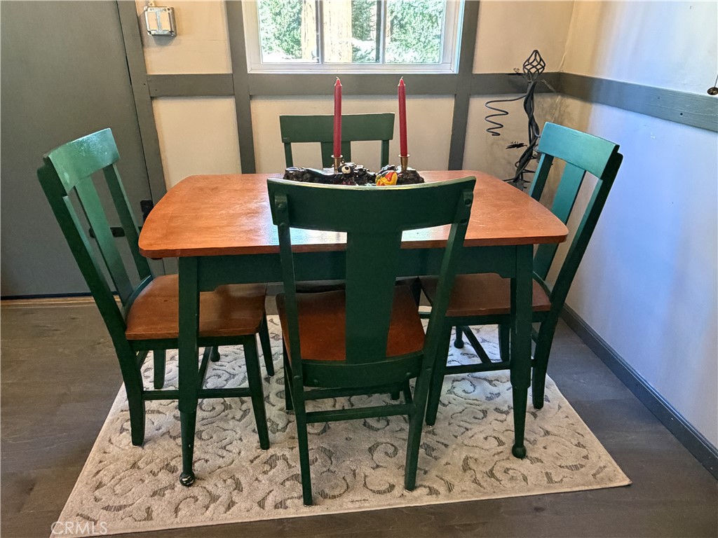 120 Barton Flats Road Angelus Oaks, CA 92305 - Photo 22 of 57 a view of a dining room with furniture and wooden floor