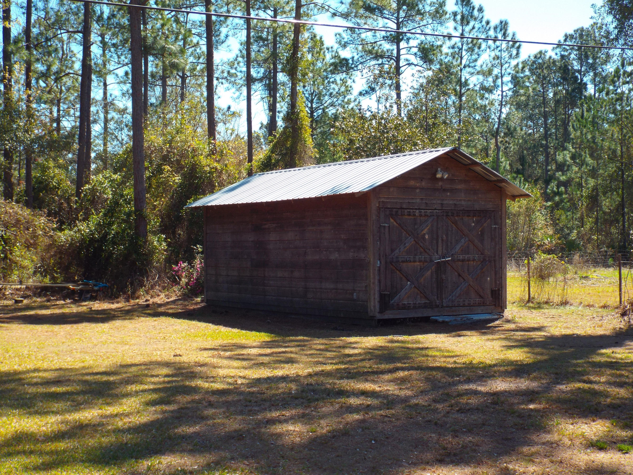 139 Canova Road Fleming Island, FL 32003 - Photo 23 of 30 12' x 20' built-on-site storage building