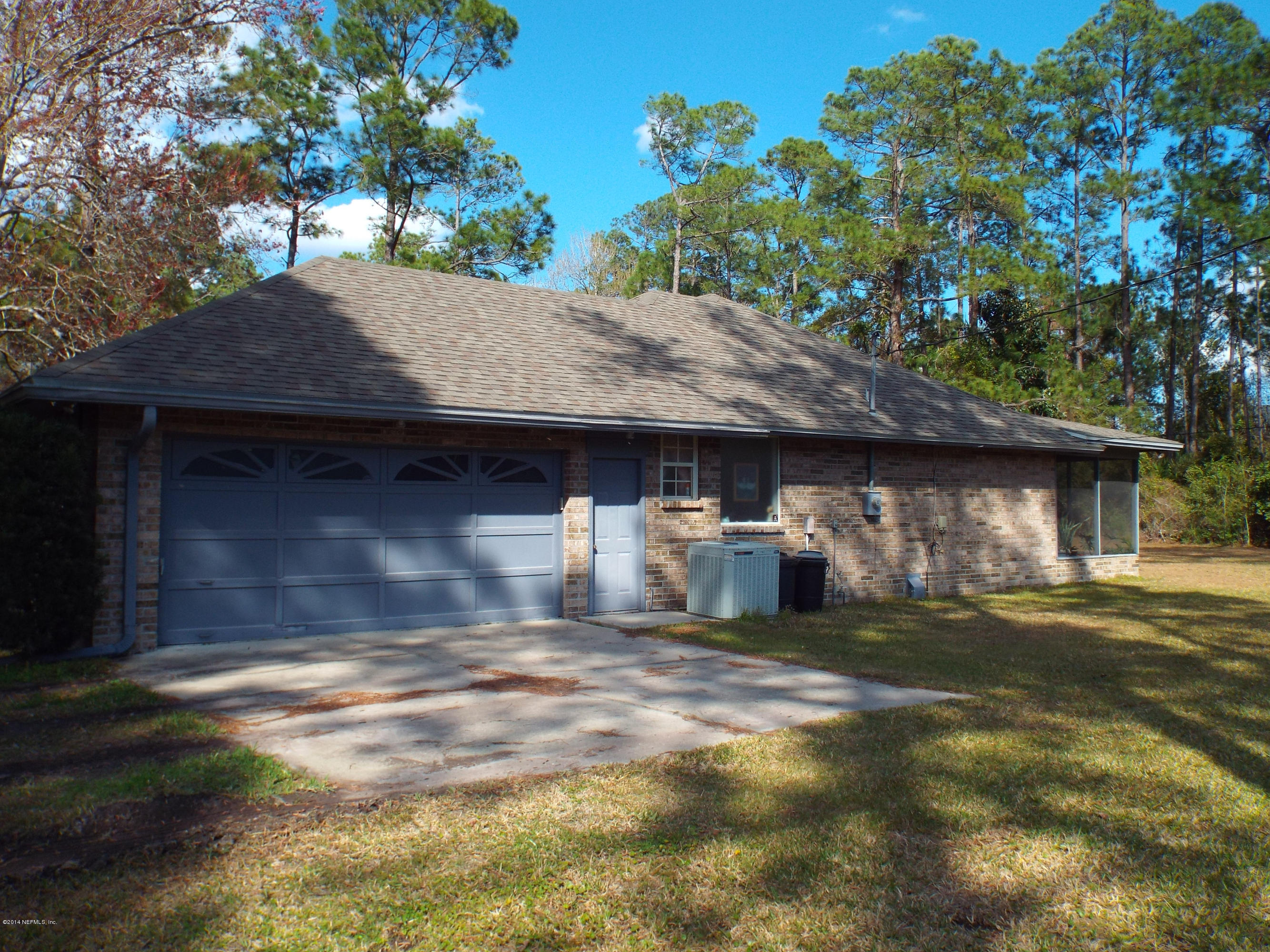 139 Canova Road Fleming Island, FL 32003 - Photo 24 of 30 Side entrance two-car garage