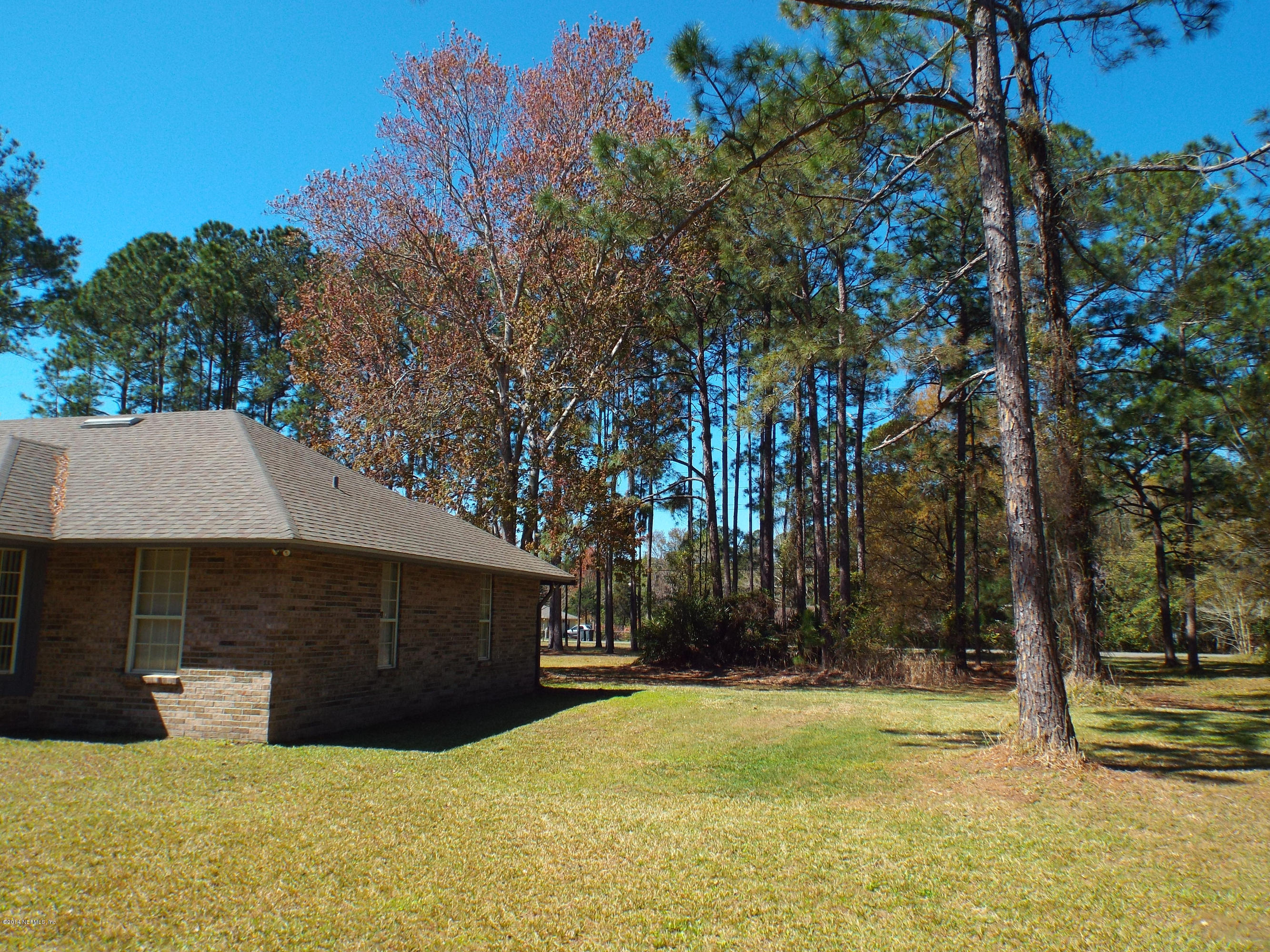 139 Canova Road Fleming Island, FL 32003 - Photo 29 of 30 Left side facing the front
