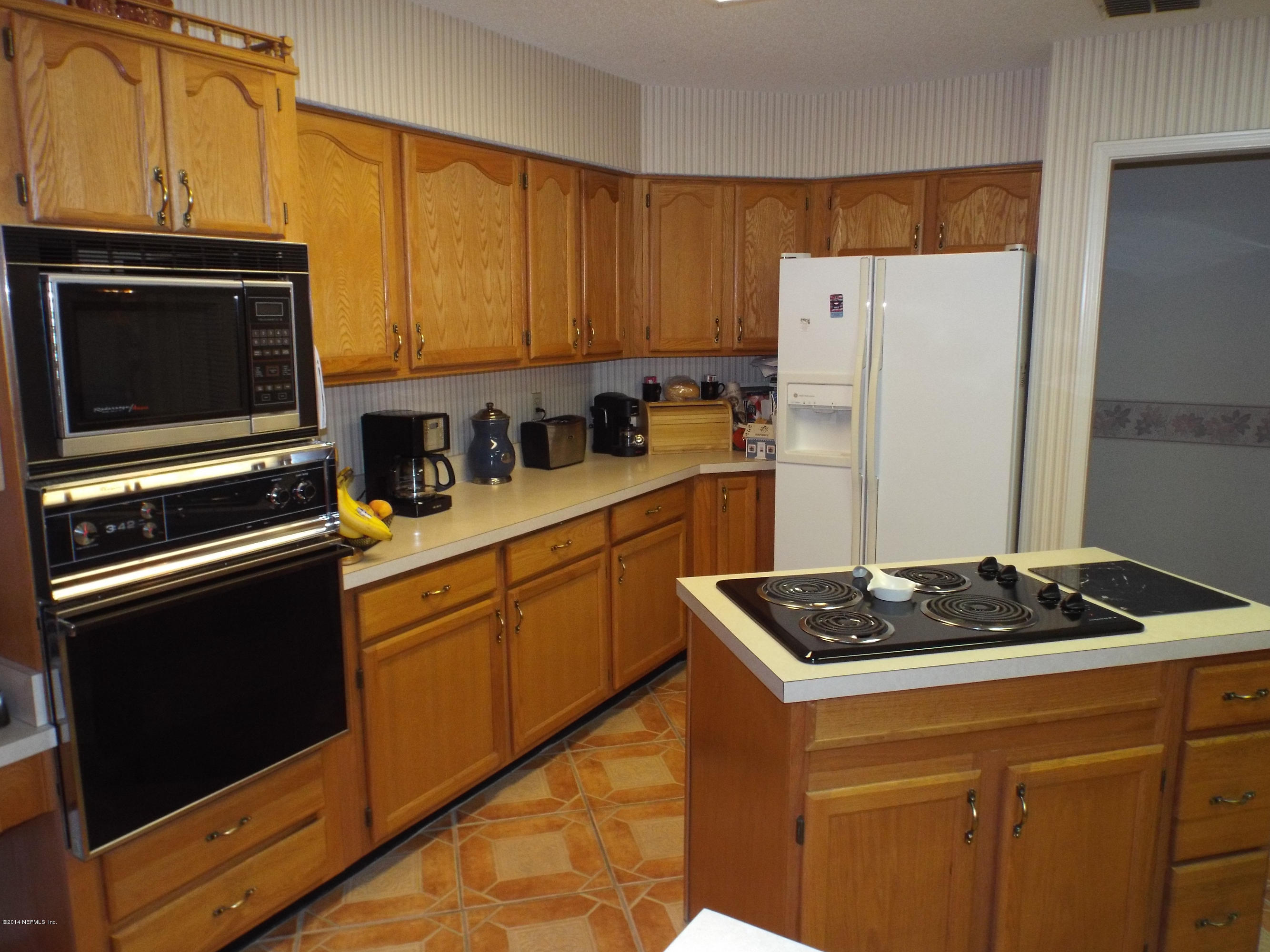 139 Canova Road Fleming Island, FL 32003 - Photo 10 of 30 Island stove and food prep
