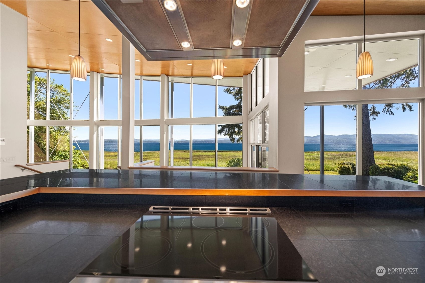 15550 Sandridge Road Long Beach, WA 98631 - Photo 11 of 36 a kitchen with a sink and a large window