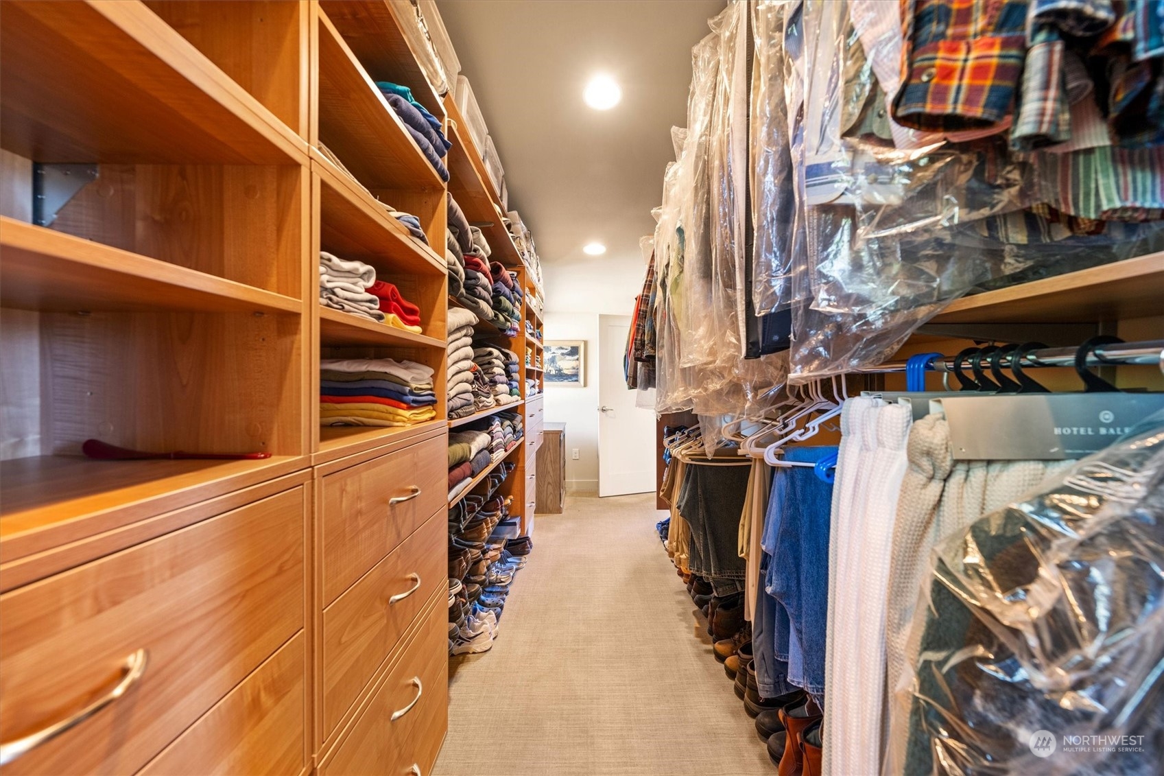 15550 Sandridge Road Long Beach, WA 98631 - Photo 23 of 36 a view of walk in closet with clothes and shoes