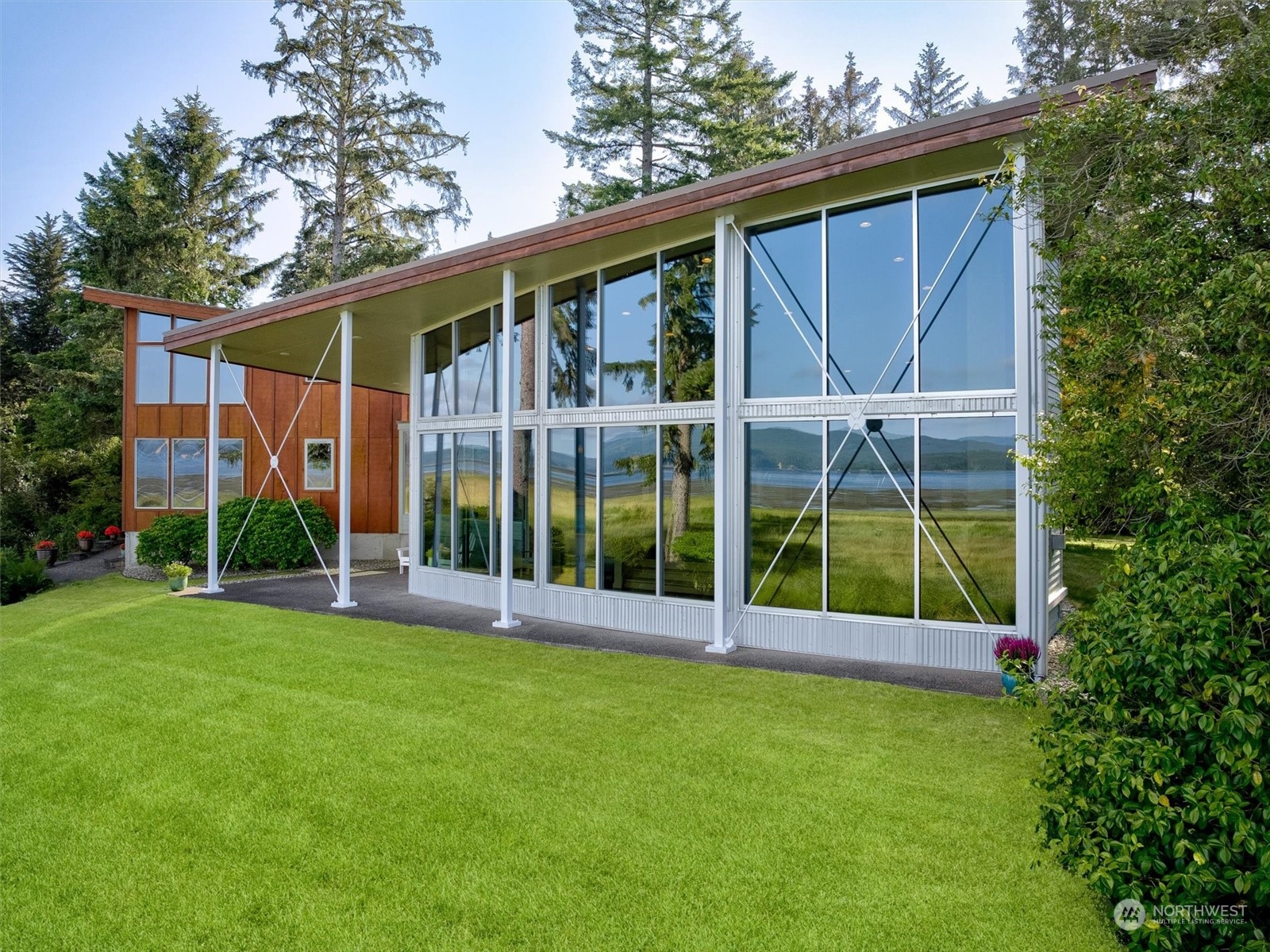15550 Sandridge Road Long Beach, WA 98631 - Photo 28 of 36 a view of a house with backyard and porch