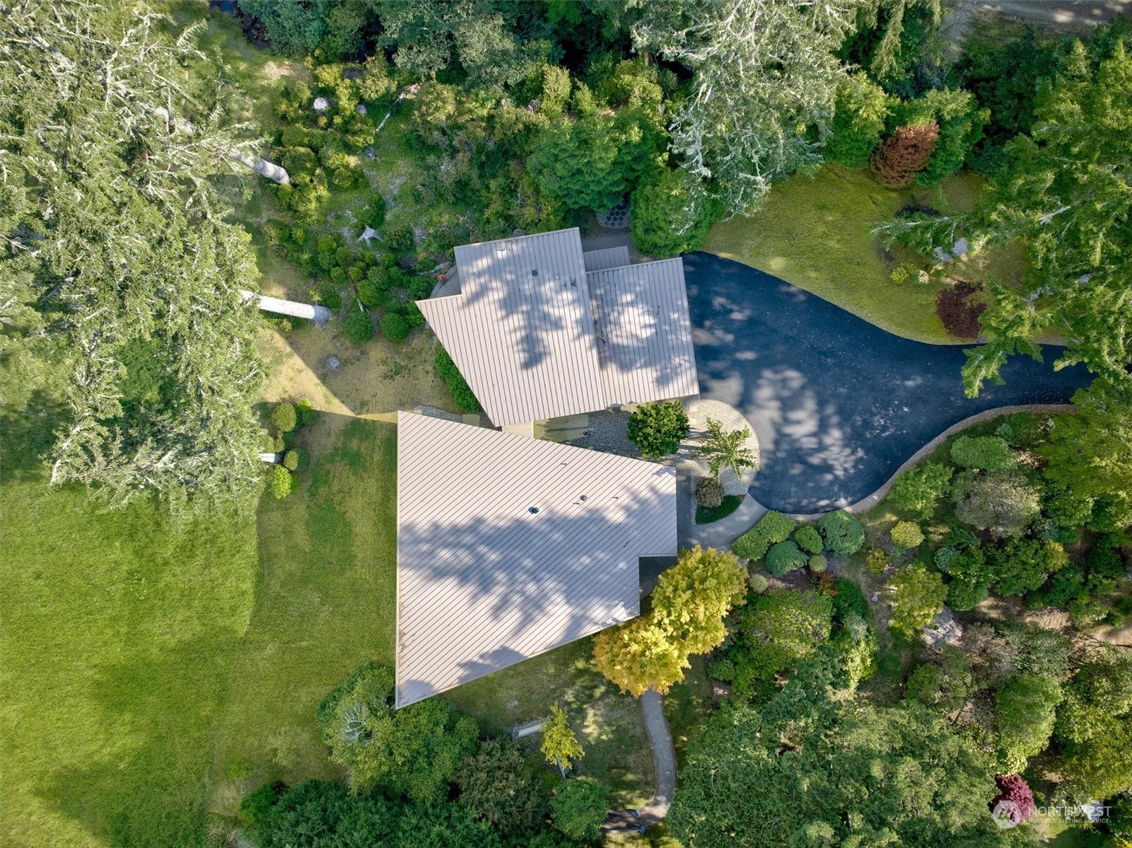 15550 Sandridge Road Long Beach, WA 98631 - Photo 32 of 36 an aerial view of a house with a yard