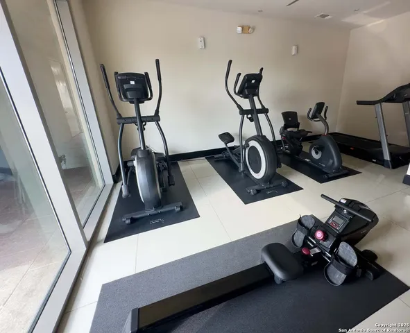 a view of a room with gym equipment
