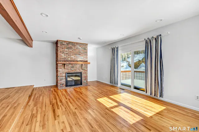 a view of a bedroom with furniture and staircase