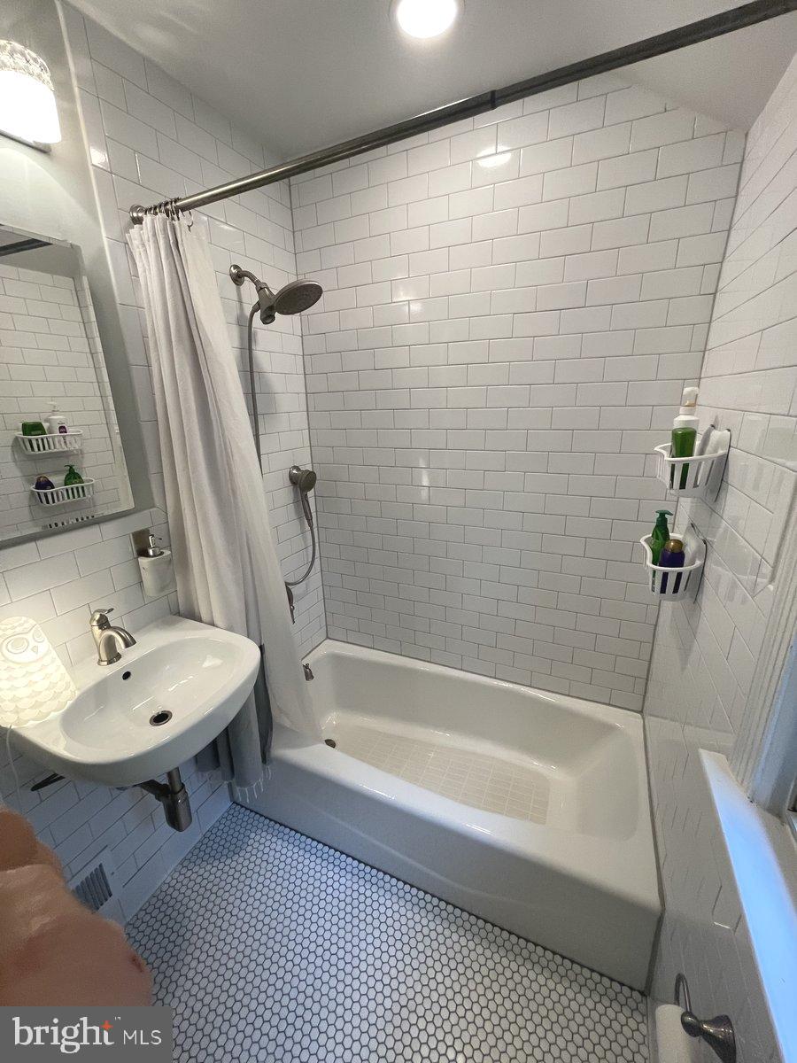 8306 Queen Annes Drive Silver Spring, MD 20910 - Photo 16 of 37 Remodeled primary bathroom