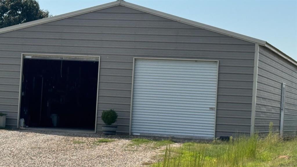 768 County Road 2220 Talco, TX 75487 - Photo 12 of 40 a backyard of a house