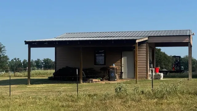 a view of a lake with a big yard